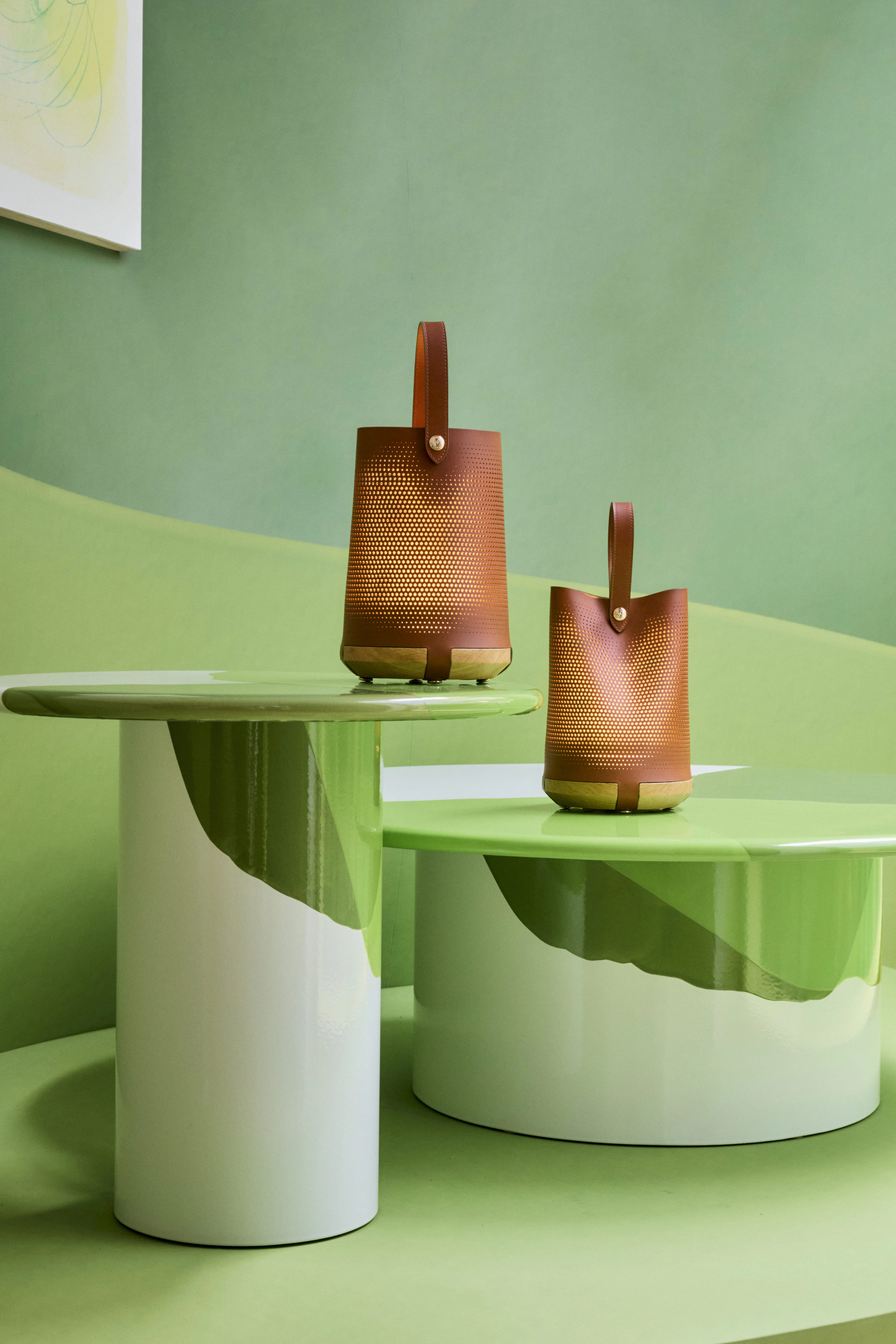 Longchamp x Patrick Jouin perforated leather lanterns on green lacquered tables, Milan 2026