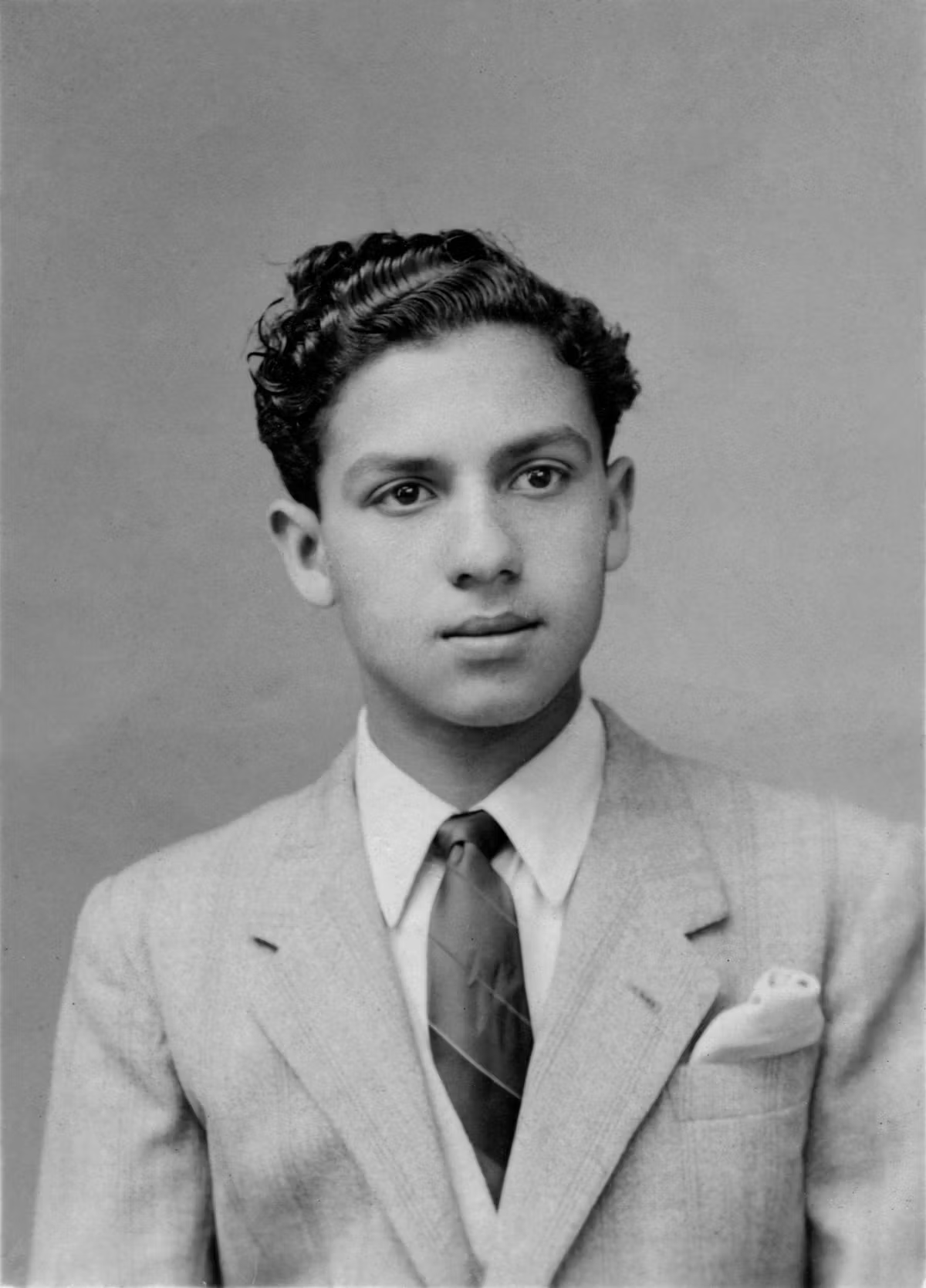 Azzedine Alaa aged 15, formal portrait photograph taken in Tunis, 1950
