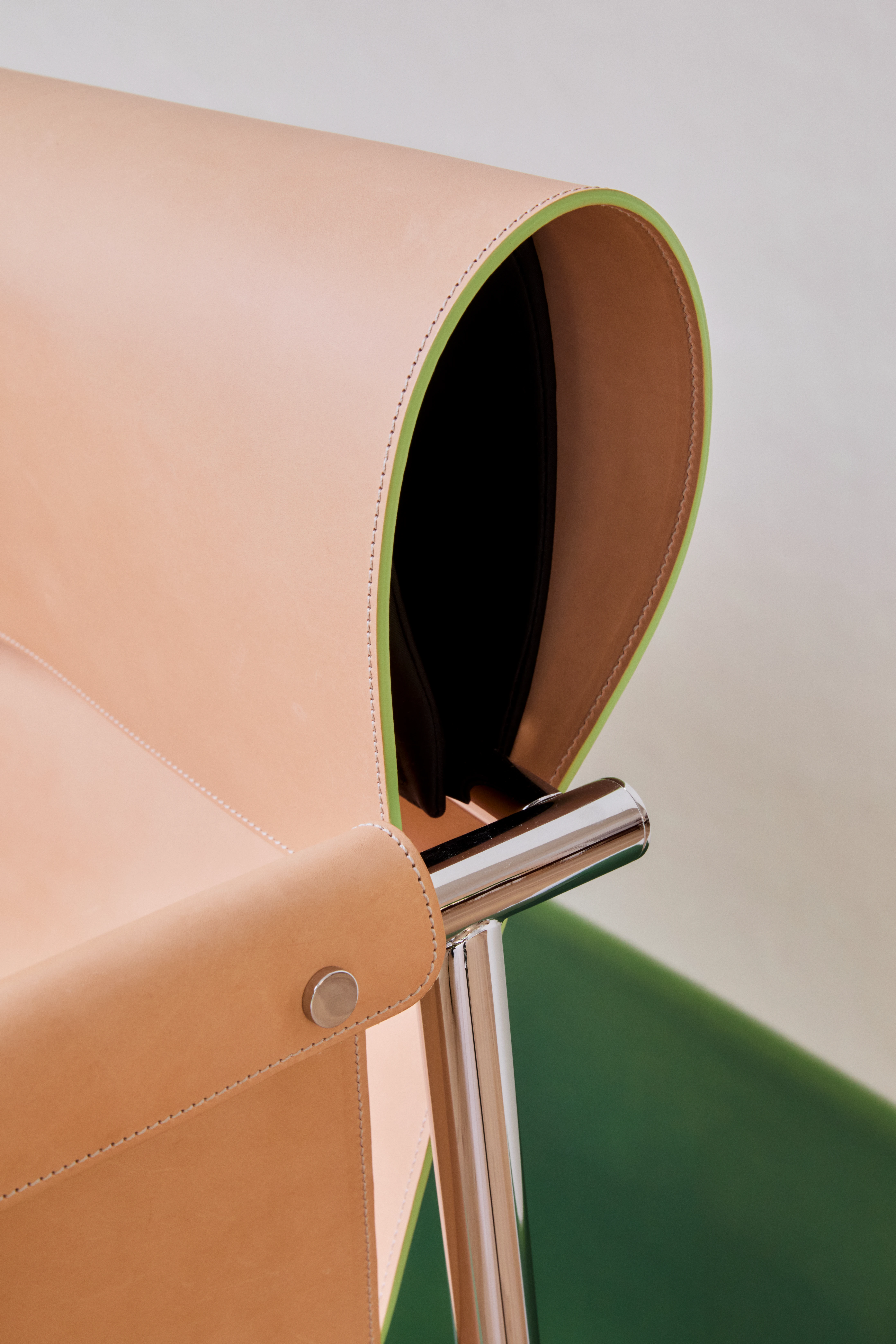 Longchamp x Patrick Jouin leather and chrome chair detail, Milan installation 2026