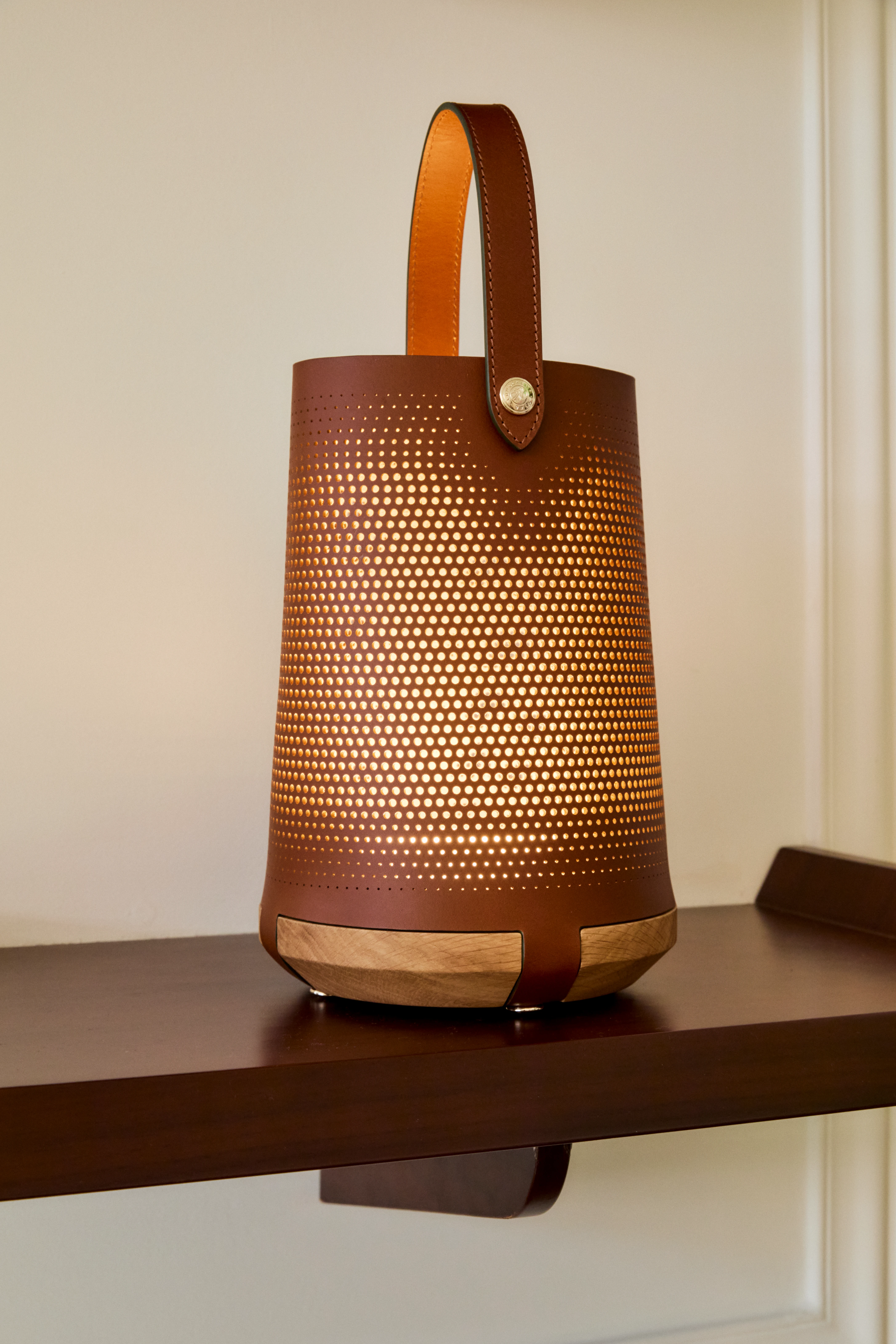 Longchamp x Patrick Jouin perforated leather lantern lamp with wooden base, Milan 2026